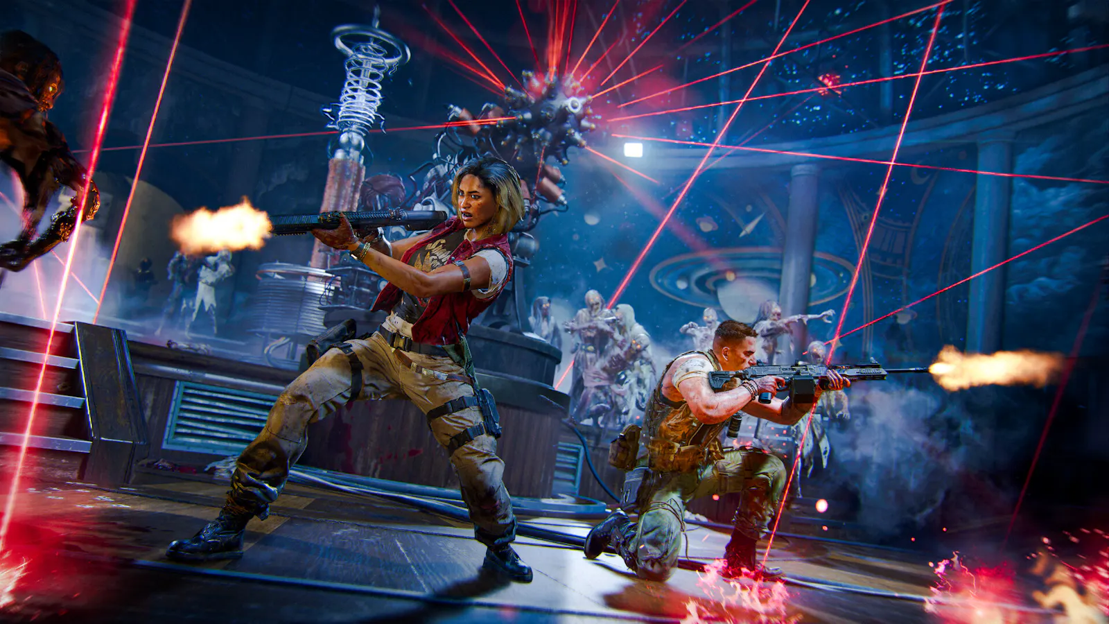 Members of the Zombies crew are defending themselves from Zombies, in a room filled with a device shooting off red lasers.