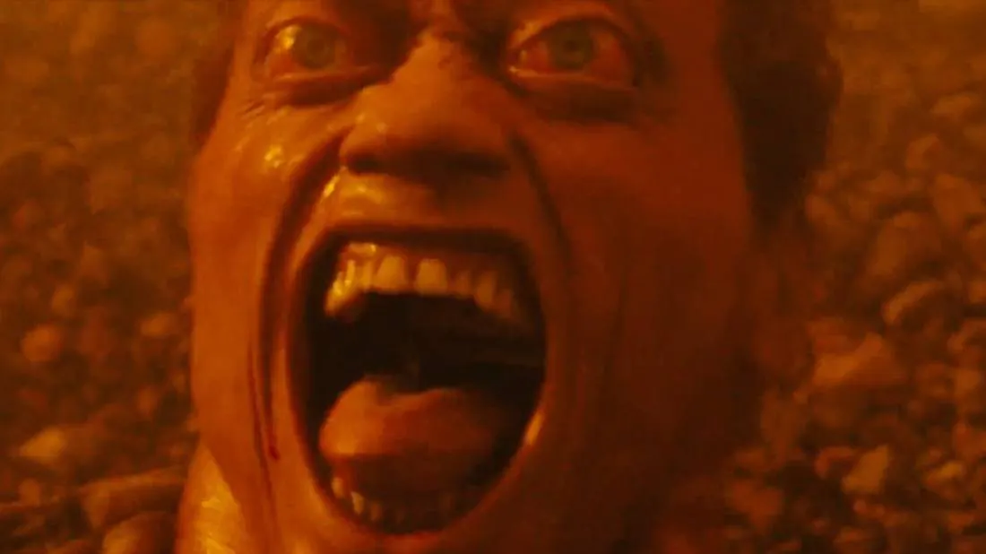 Scene from the movie Total Recall where the main character suffers from the effect of being dropped on a planet surface with no atmosphere